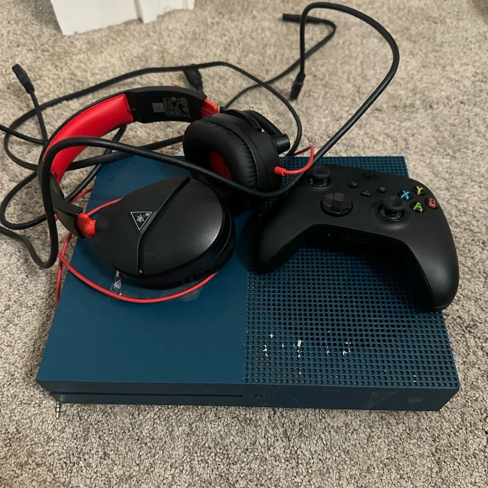 Xbox Console with Black Controller and Red Headset